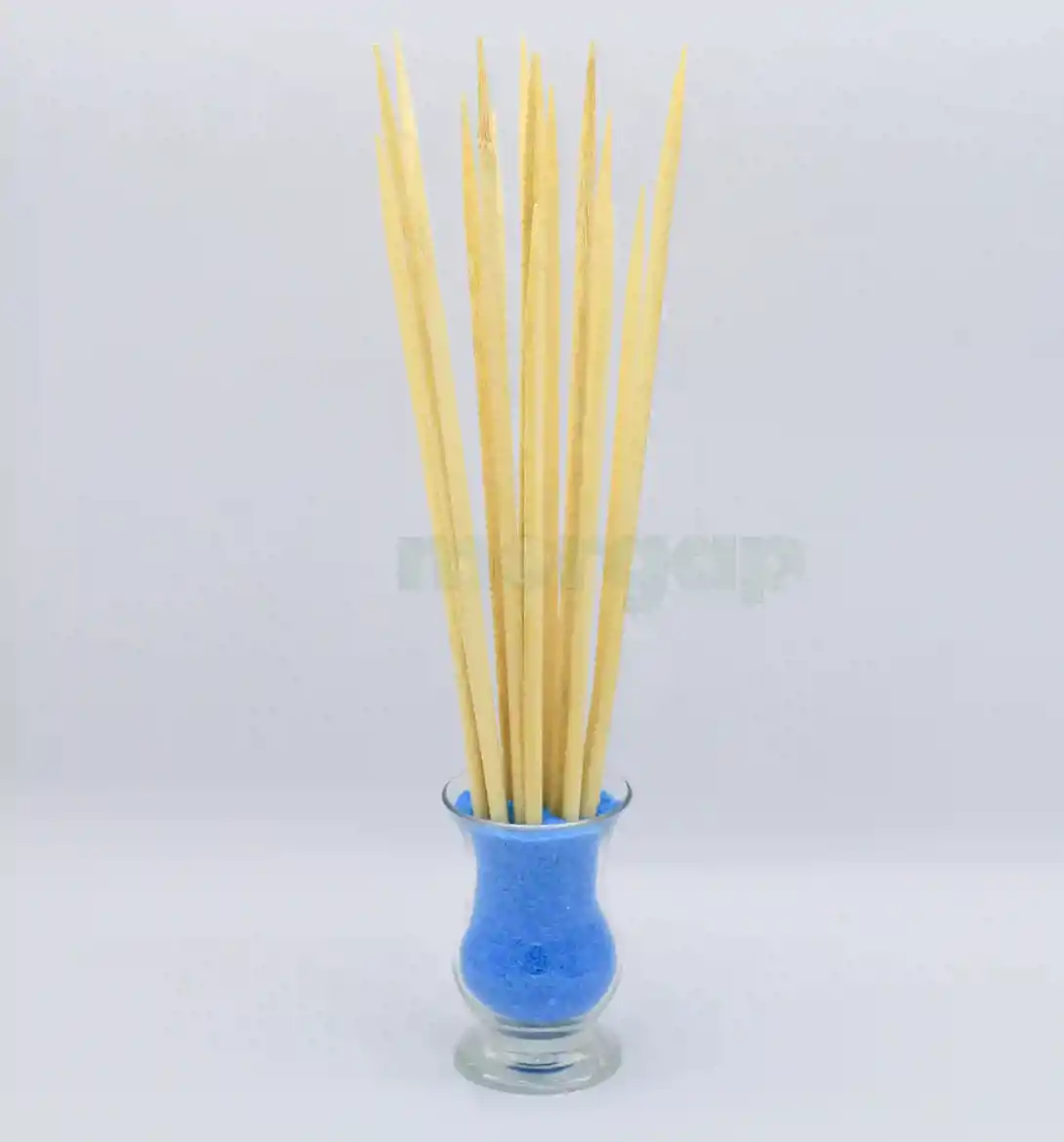 صورة عود شواء خشب وسط